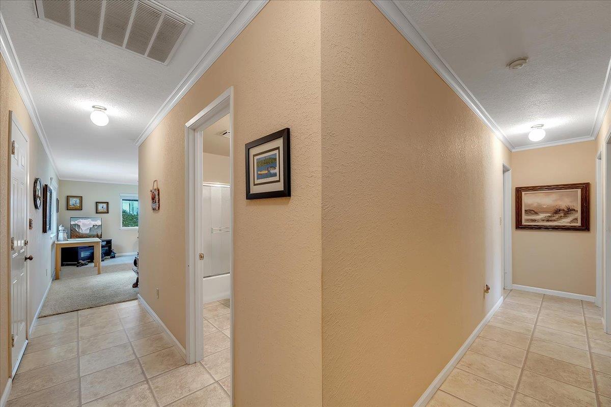 342 Poker Flat Road, Unit 239 Copperopolis, CA 95228 - Photo 7 of 72 Easy-care flooring in the entry, hallways, kitchen and baths.