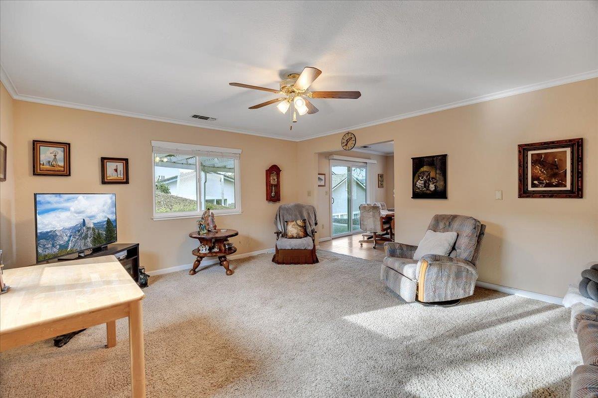 342 Poker Flat Road, Unit 239 Copperopolis, CA 95228 - Photo 8 of 72 Light & bright living room with newer dual paned windows/sliders.