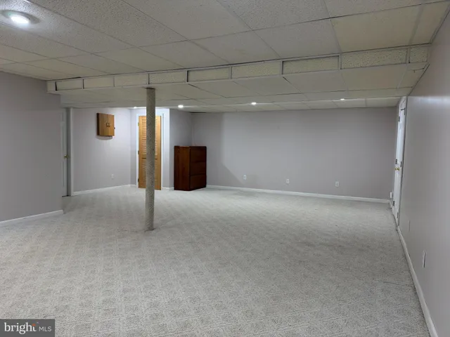 view of a room with a small space and a window