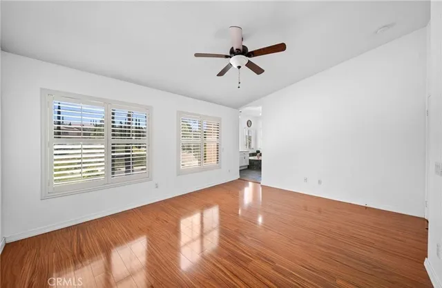a bathroom with a sink a mirror and a window