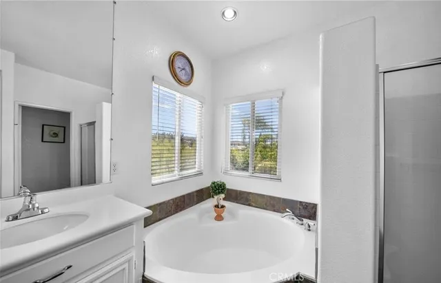 an aerial view of a house with outdoor space and street view