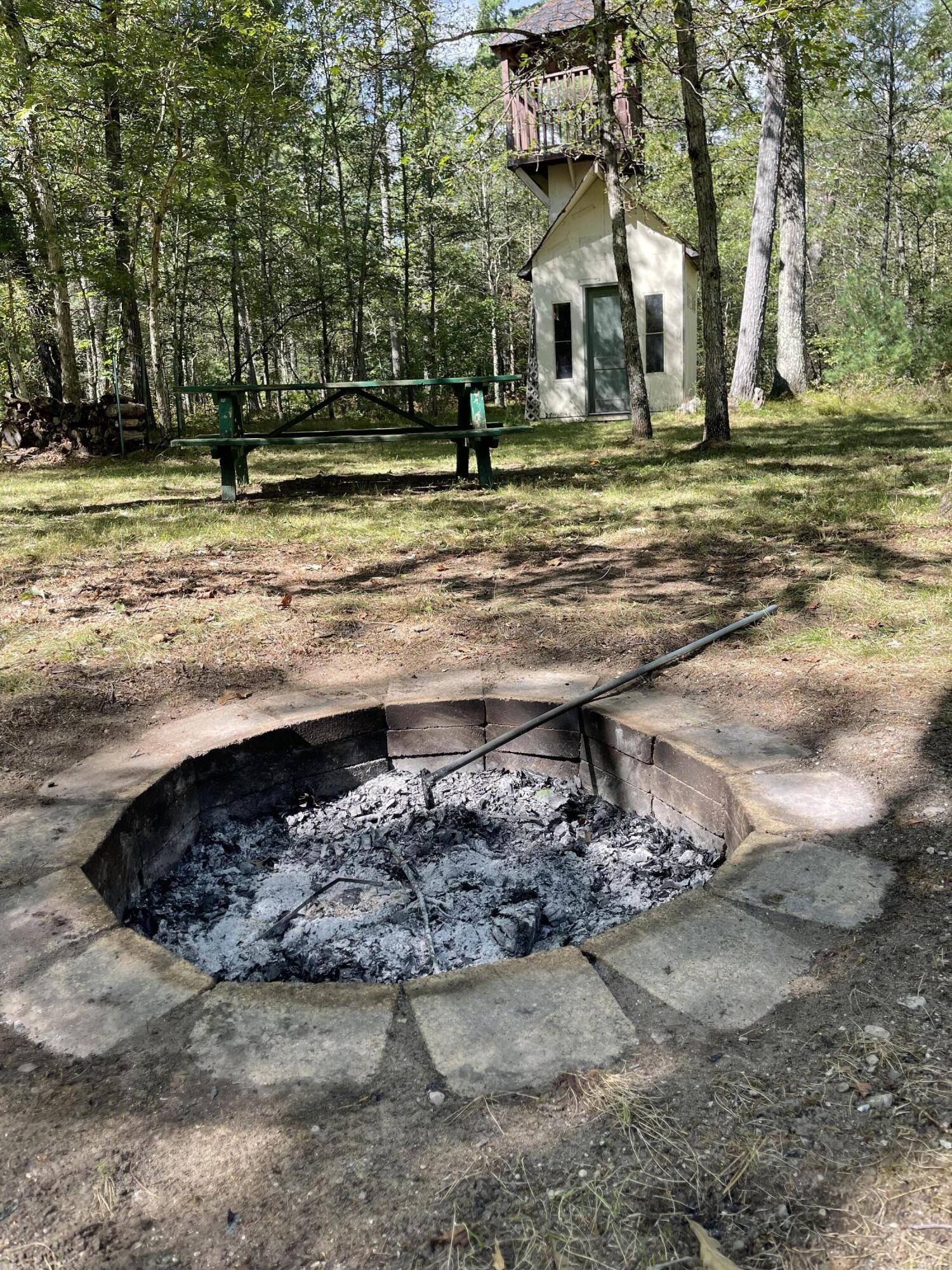 2680 Brunswick Road Holton, MI 49425 - Photo 36 of 45 firepit