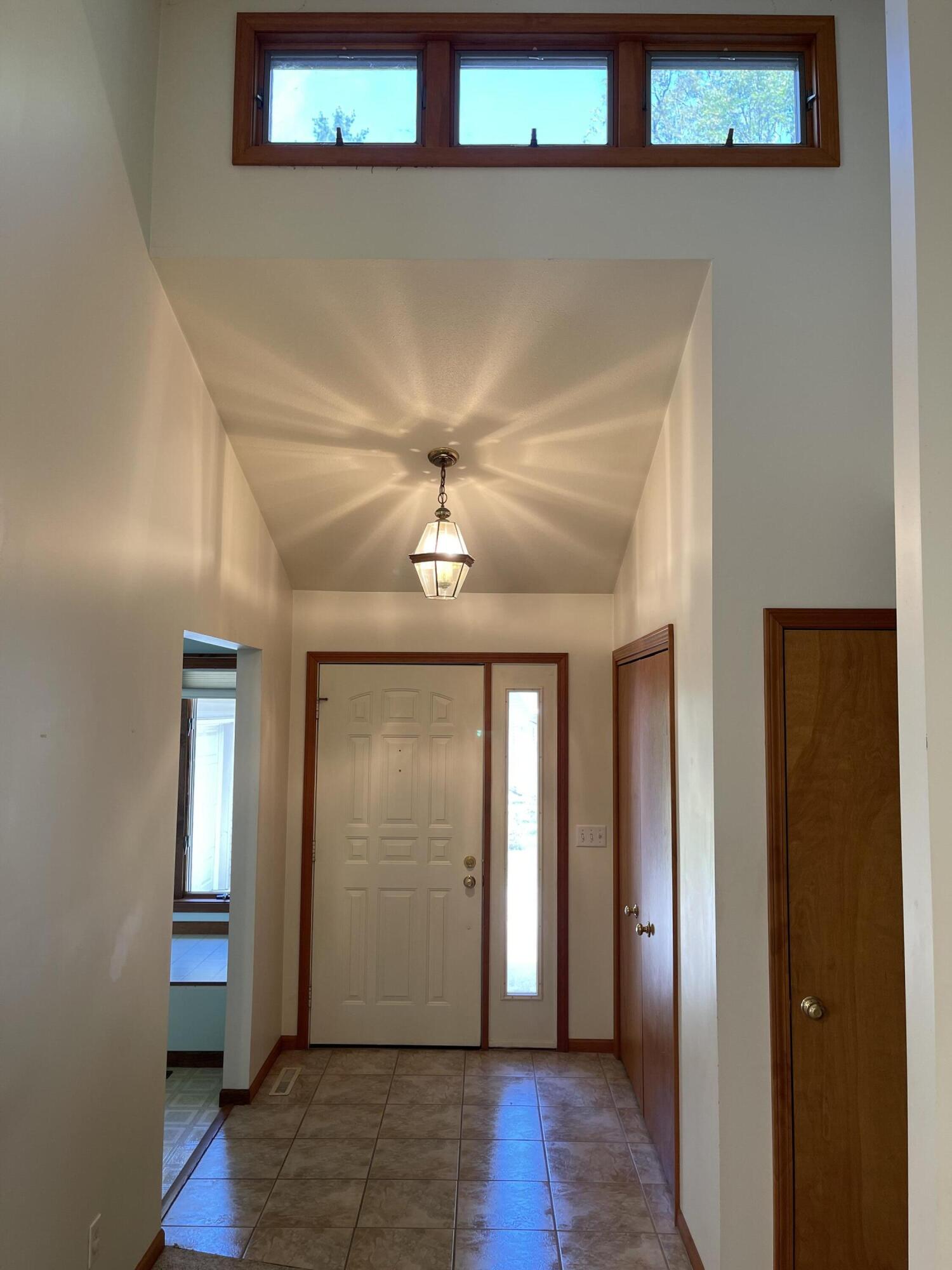 2680 Brunswick Road Holton, MI 49425 - Photo 5 of 45 foyer bright