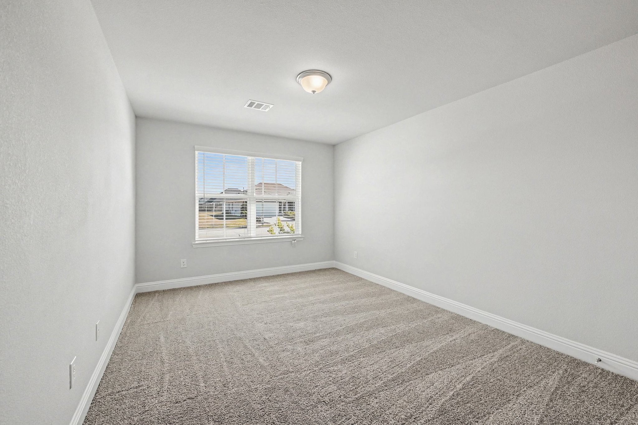 601 Greystone Lane Angleton, TX 77515 - Photo 28 of 32 an empty room with windows
