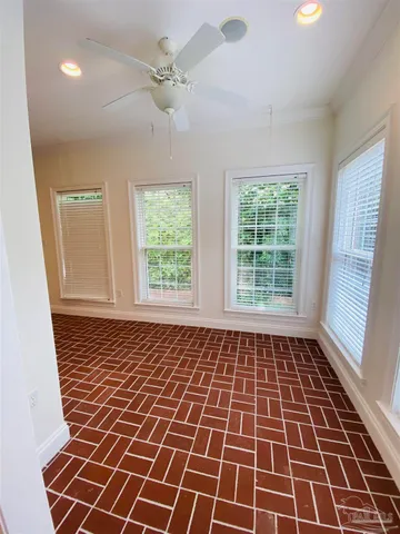 a picture of an empty room with a window