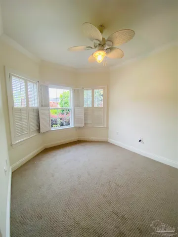 a kitchen with cabinets and stainless steel appliances