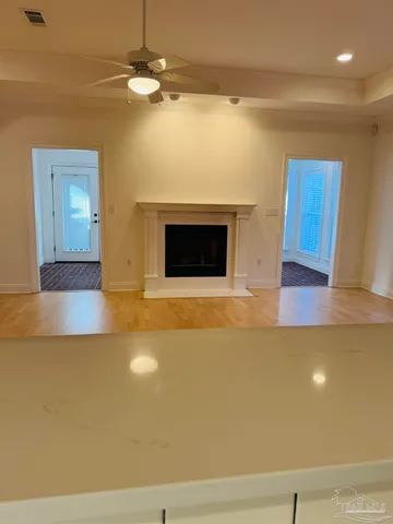 a view of a pathway of a house with backyard