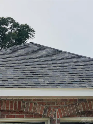 a bathroom with a double vanity sink and mirror