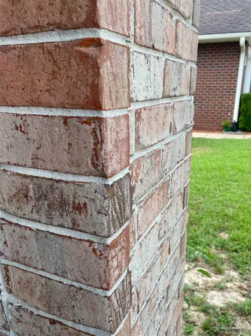 a view of empty room with wooden floor and outdoor seating