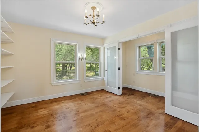 a view of a swimming pool with a yard