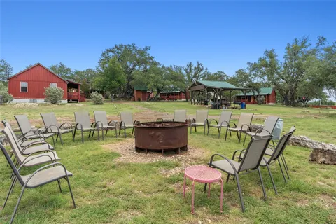 a view of a porch with wooden floor of a house