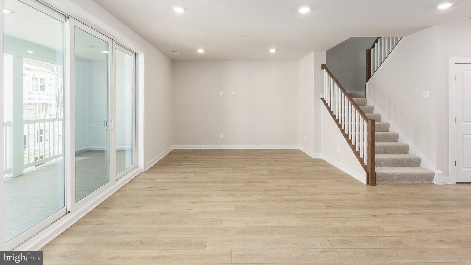 20821 Cloongee Terrace Sterling, VA 20166 - Photo 13 of 34 a view of an entryway with wooden floor