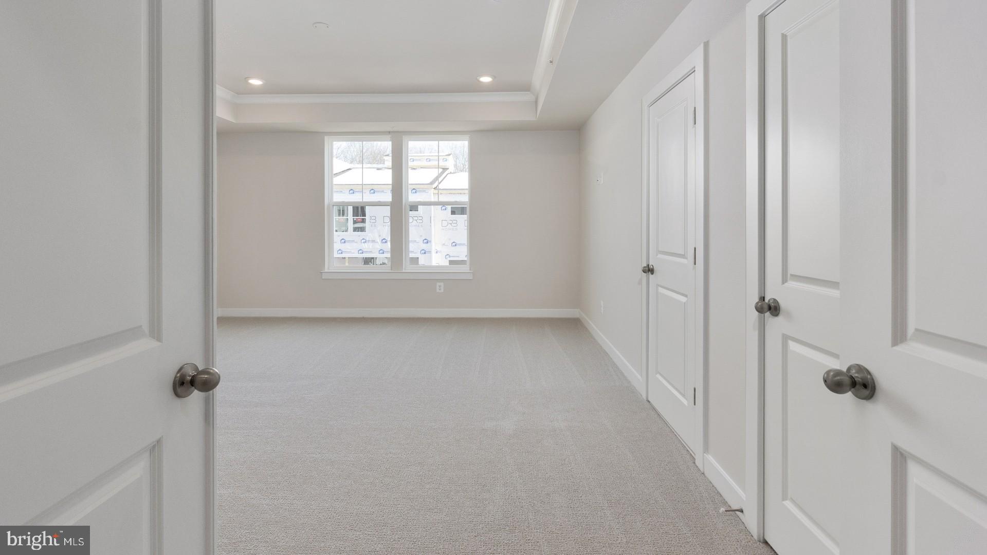 20821 Cloongee Terrace Sterling, VA 20166 - Photo 20 of 34 a view of a hallway with a window
