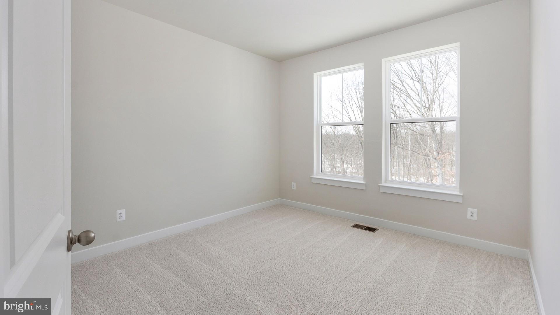 20821 Cloongee Terrace Sterling, VA 20166 - Photo 27 of 34 an empty room with a window
