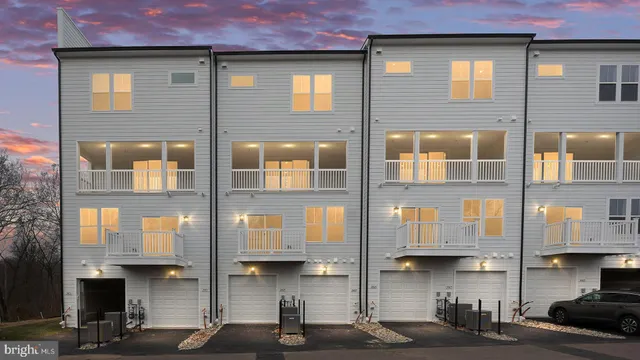 a front view of a building with glass windows