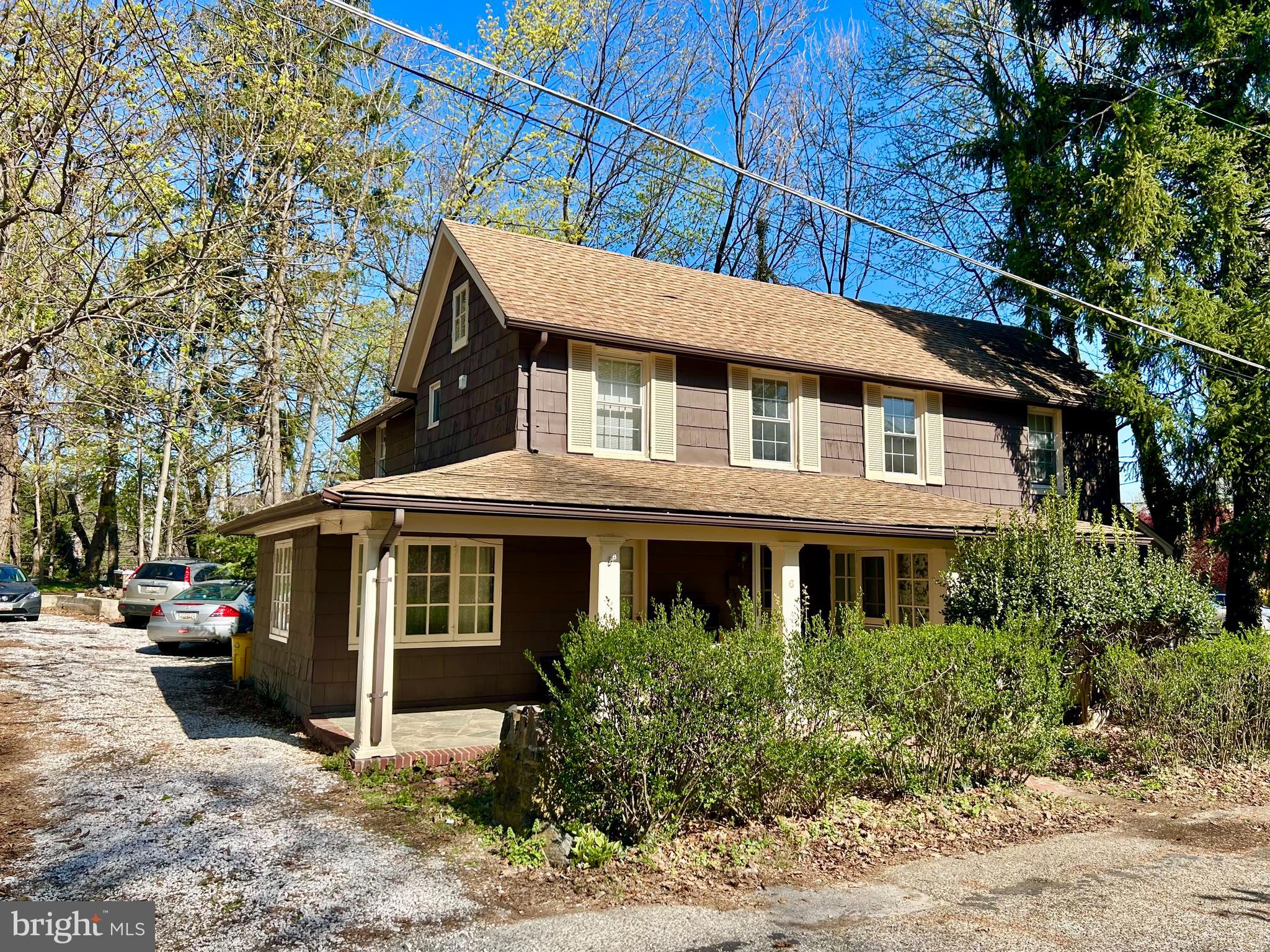 6 Cedar Avenue Towson, MD 21286 - Photo 2 of 10 a front view of a house with a garden