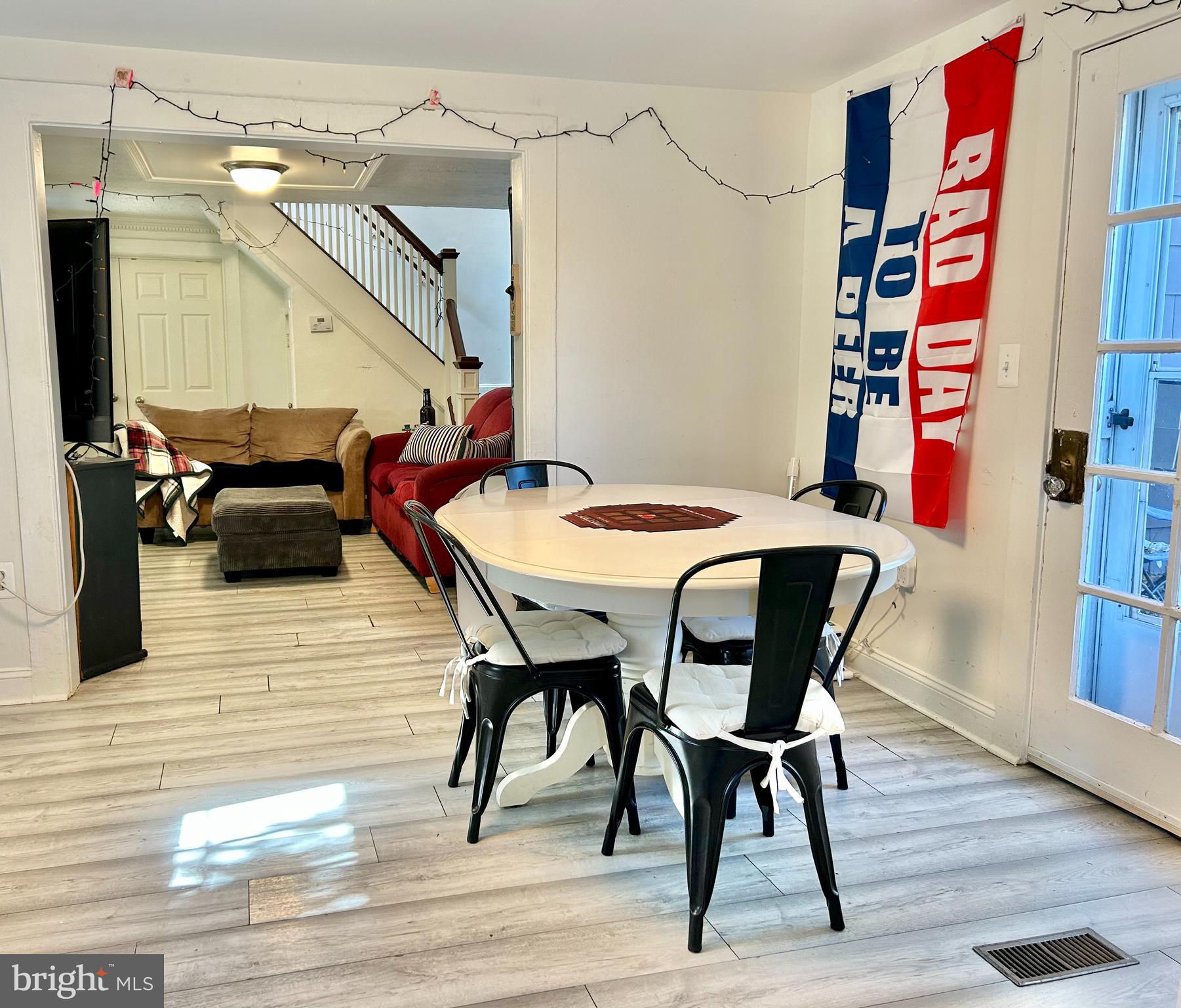 6 Cedar Avenue Towson, MD 21286 - Photo 5 of 10 a dining room with furniture and wooden floor
