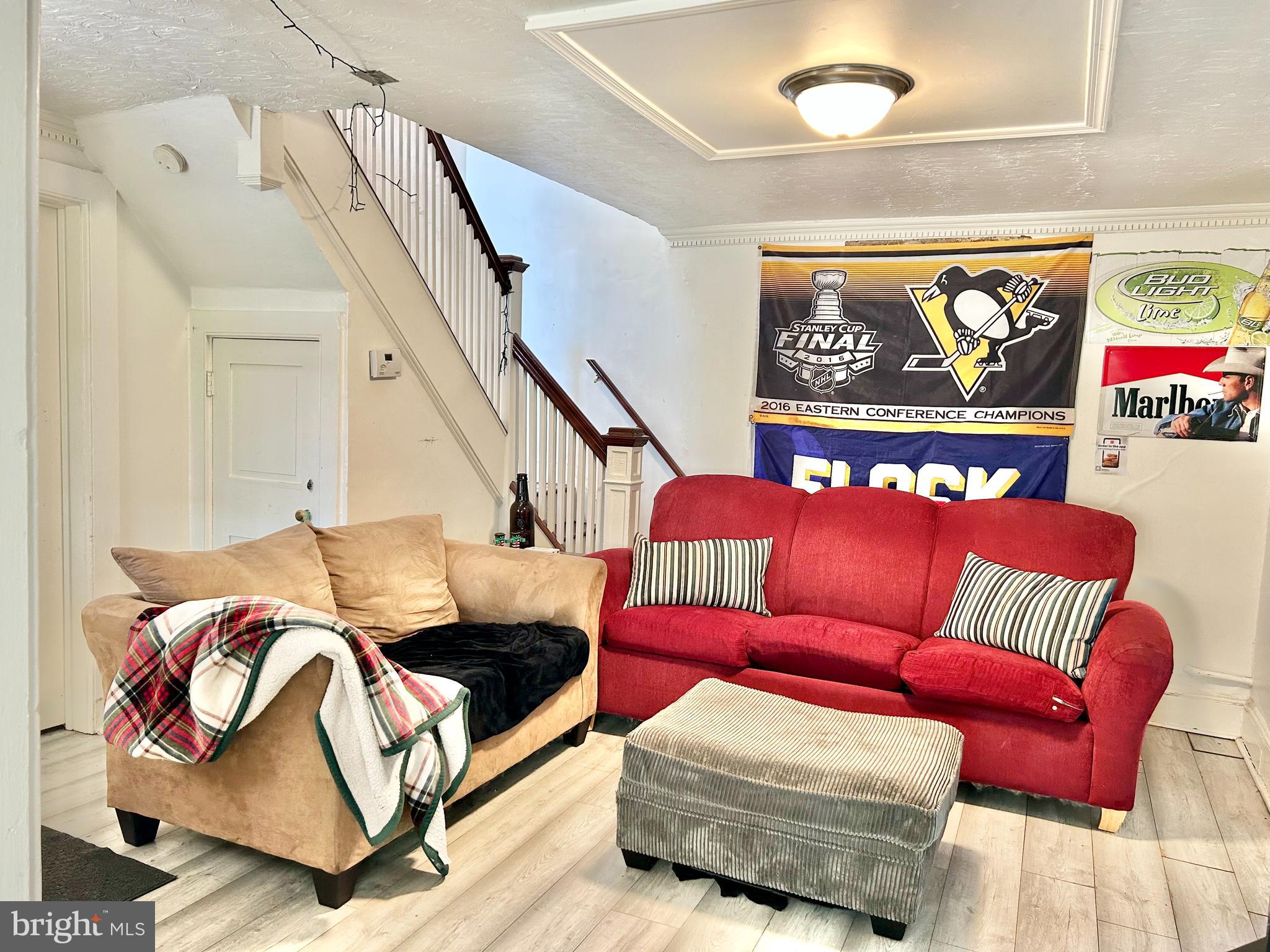 6 Cedar Avenue Towson, MD 21286 - Photo 7 of 10 a bedroom with furniture and a couch