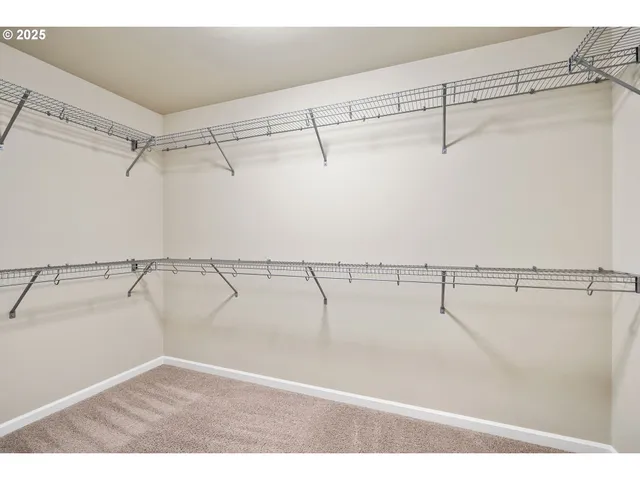 a view of a room with racks on the wall