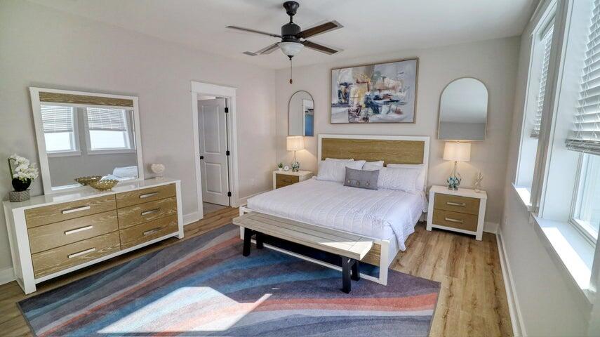 181 Valdare Ln Inlet Beach Inlet Beach, FL 32461 - Photo 11 of 32 a bedroom with a bed and wooden floor