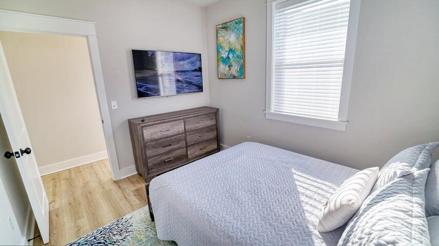 181 Valdare Ln Inlet Beach Inlet Beach, FL 32461 - Photo 16 of 32 a bedroom with a bed and a dresser in it