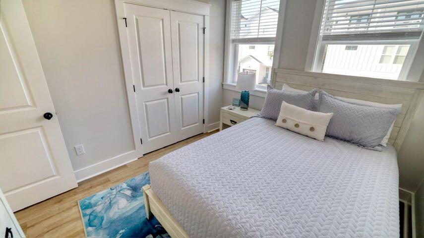 181 Valdare Ln Inlet Beach Inlet Beach, FL 32461 - Photo 18 of 32 a bed room with a bed and a window