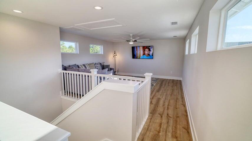 181 Valdare Ln Inlet Beach Inlet Beach, FL 32461 - Photo 25 of 32 a view of a hallway with windows