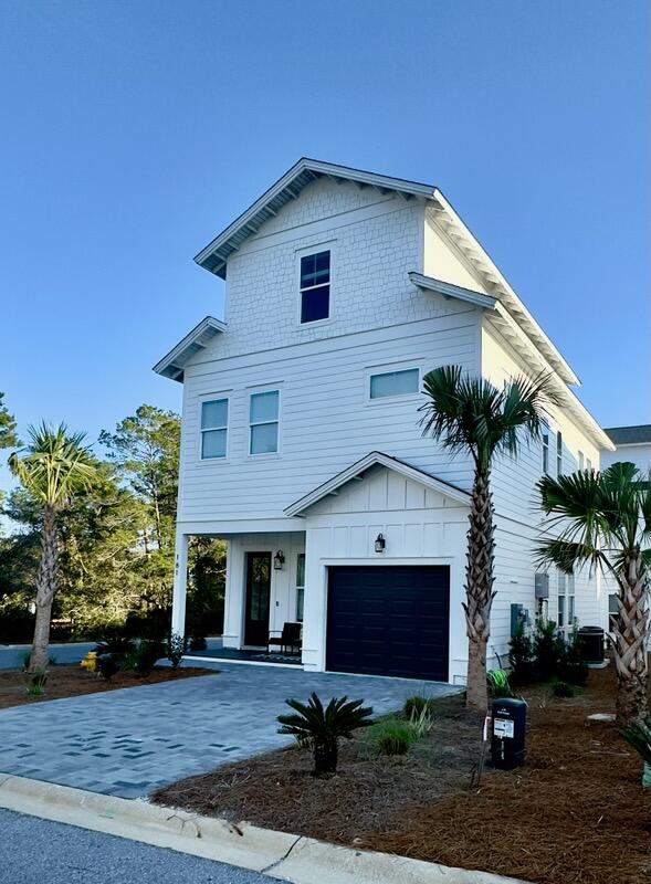 181 Valdare Ln Inlet Beach Inlet Beach, FL 32461 - Photo 4 of 32 a front view of a house with a yard