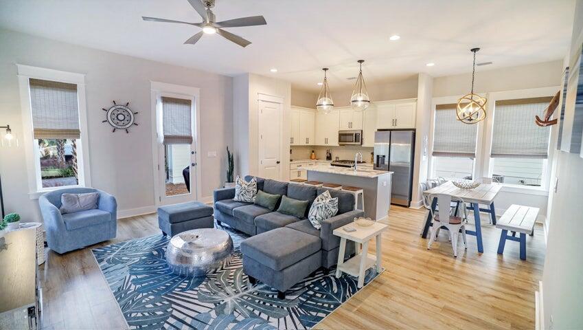181 Valdare Ln Inlet Beach Inlet Beach, FL 32461 - Photo 6 of 32 a living room with furniture kitchen view and a chandelier