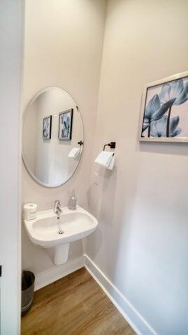 181 Valdare Ln Inlet Beach Inlet Beach, FL 32461 - Photo 9 of 32 a bathroom with a sink and a mirror