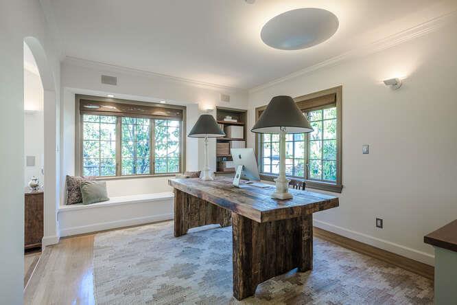 236 Clark Drive San Mateo, CA 94402 - Photo 14 of 58 a dining hall with granite countertop a sink dishwasher and a black refrigerator
