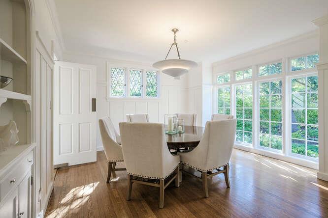 236 Clark Drive San Mateo, CA 94402 - Photo 16 of 58 a view of a dining room with furniture window and wooden floor