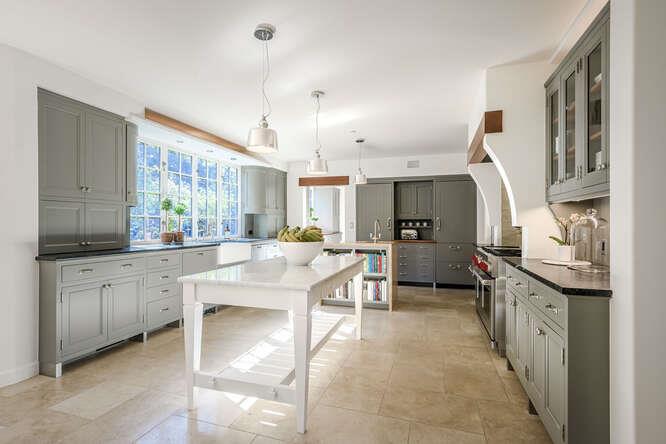 236 Clark Drive San Mateo, CA 94402 - Photo 18 of 58 a kitchen with granite countertop a sink stove and cabinets