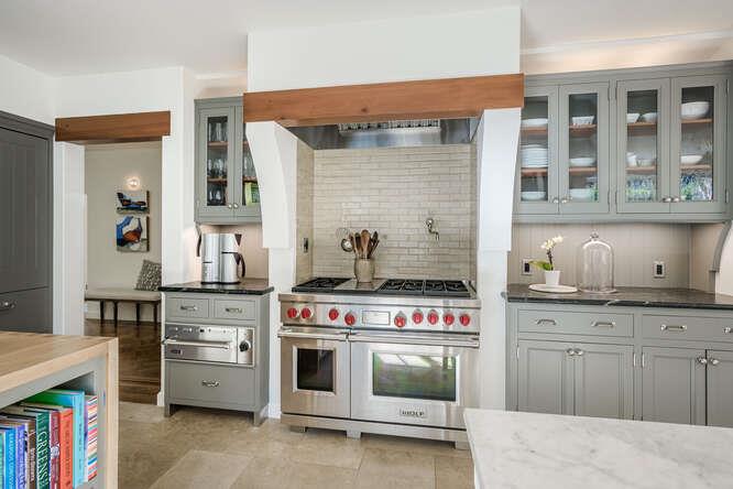 236 Clark Drive San Mateo, CA 94402 - Photo 20 of 58 a kitchen with a stove and cabinets