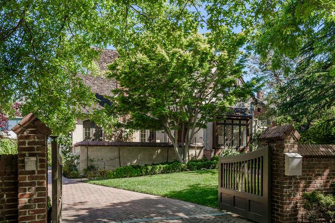 236 Clark Drive San Mateo, CA 94402 - Photo 2 of 58 a view of a house with a tree in front of it