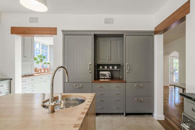 236 Clark Drive San Mateo, CA 94402 - Photo 21 of 58 a kitchen with a refrigerator and cabinets