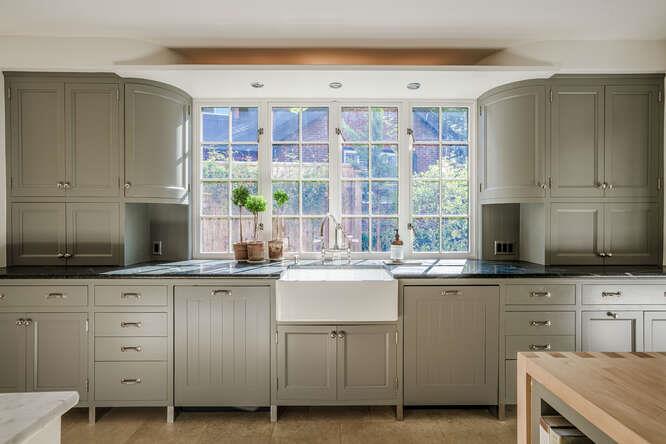 236 Clark Drive San Mateo, CA 94402 - Photo 23 of 58 a kitchen with granite countertop a sink stainless steel appliances and cabinets