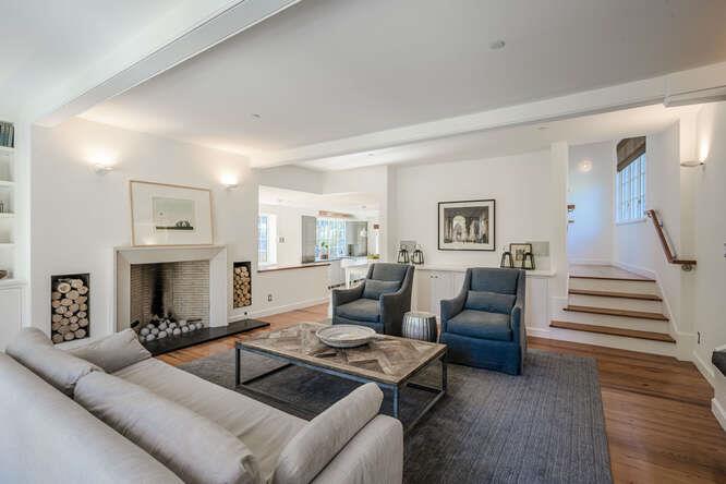 236 Clark Drive San Mateo, CA 94402 - Photo 30 of 58 a living room with furniture and a fireplace