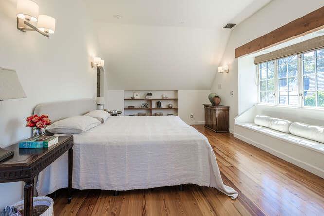 236 Clark Drive San Mateo, CA 94402 - Photo 35 of 58 a bedroom with a bed and wooden floor