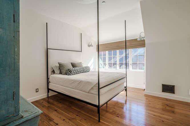 236 Clark Drive San Mateo, CA 94402 - Photo 39 of 58 a bedroom with a bed and a window