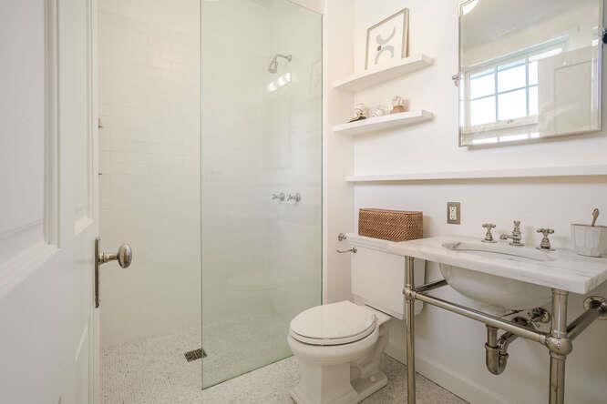 236 Clark Drive San Mateo, CA 94402 - Photo 47 of 58 a bathroom with a sink toilet and shower