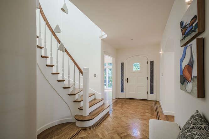 236 Clark Drive San Mateo, CA 94402 - Photo 7 of 58 a view of entryway and hall with wooden floor