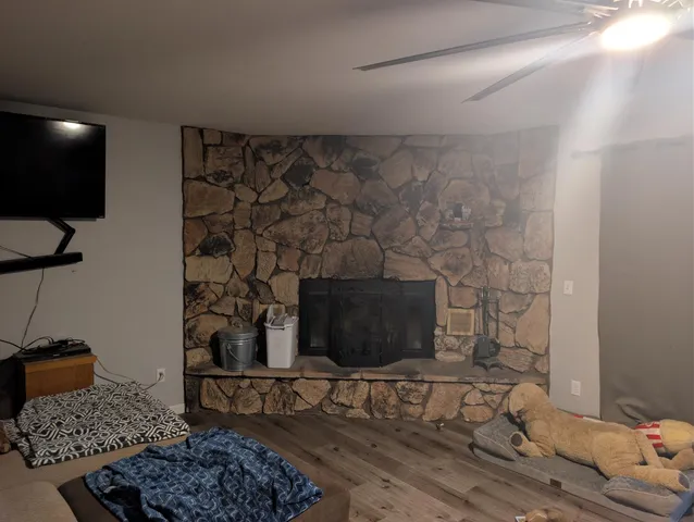 a living room with a fireplace