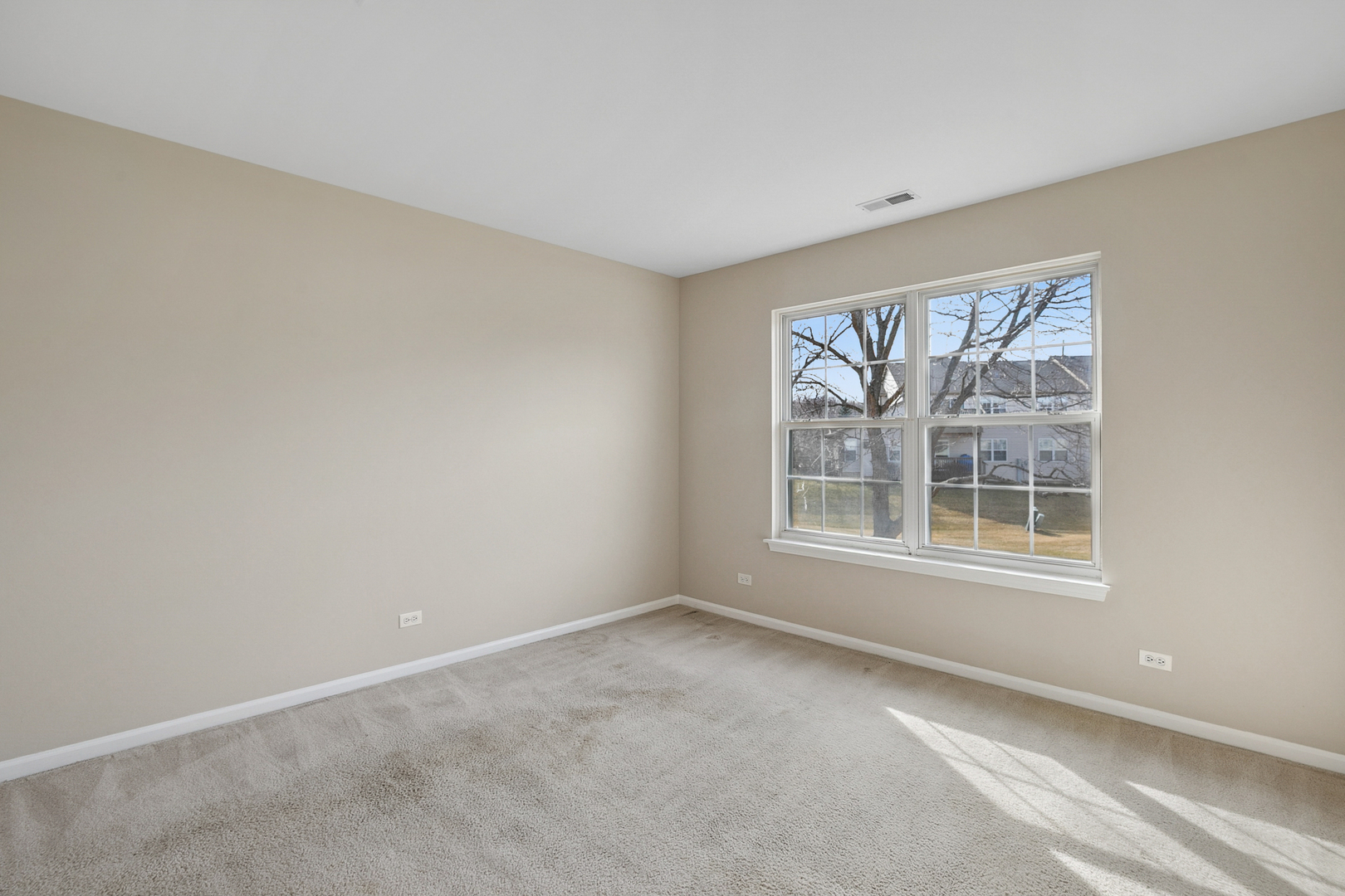 961 Sumac Court Lindenhurst, IL 60046 - Photo 16 of 22 an empty room with a window