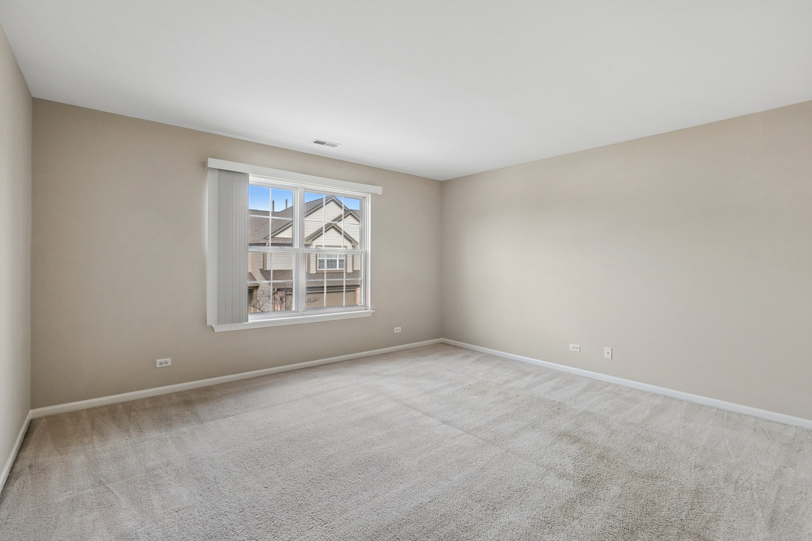 961 Sumac Court Lindenhurst, IL 60046 - Photo 18 of 22 a view of an empty room with a window