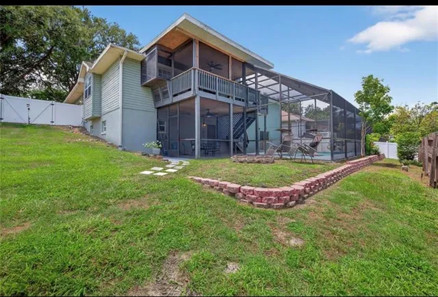 a view of a house with a swimming pool