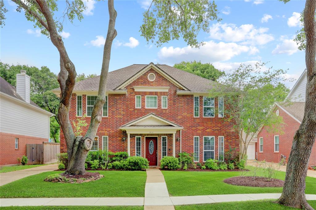 WELCOME TO THIS STUNNING TWO-STORY BRICK HOME, WHICH COMBINES CLASSIC CHARM WITH MODERN TOUCHES.  MATURE TREES FRAME THE PROPERTY, PROVIDING A PICTURESQUE SETTING AND A SENSE OF ESTABLISHED NEIGHBORHOOD WARMTH.