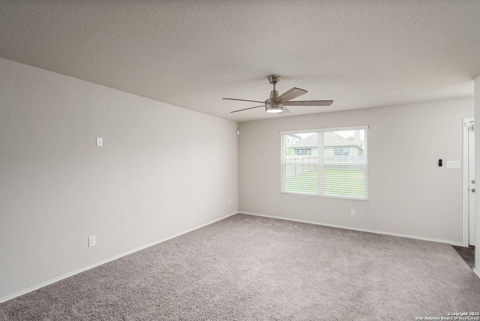 3619 Storm Moon Converse, TX 78109 - Photo 12 of 28 an empty room with a window