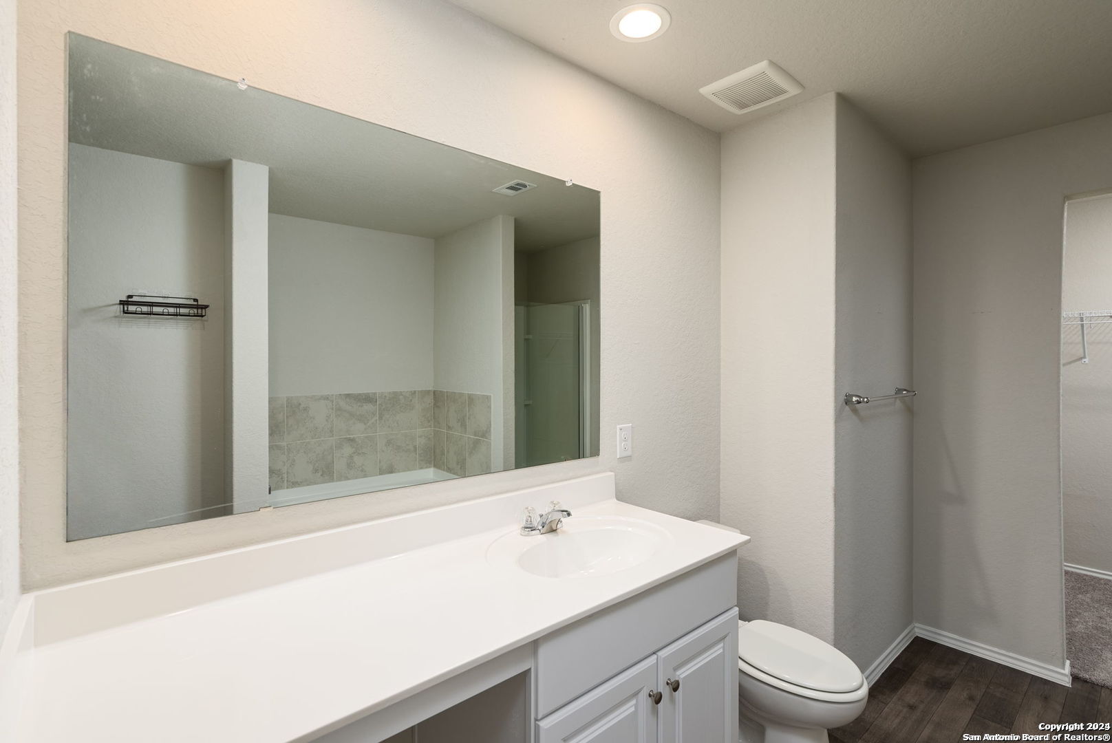 3619 Storm Moon Converse, TX 78109 - Photo 17 of 28 a bathroom with a sink and a mirror