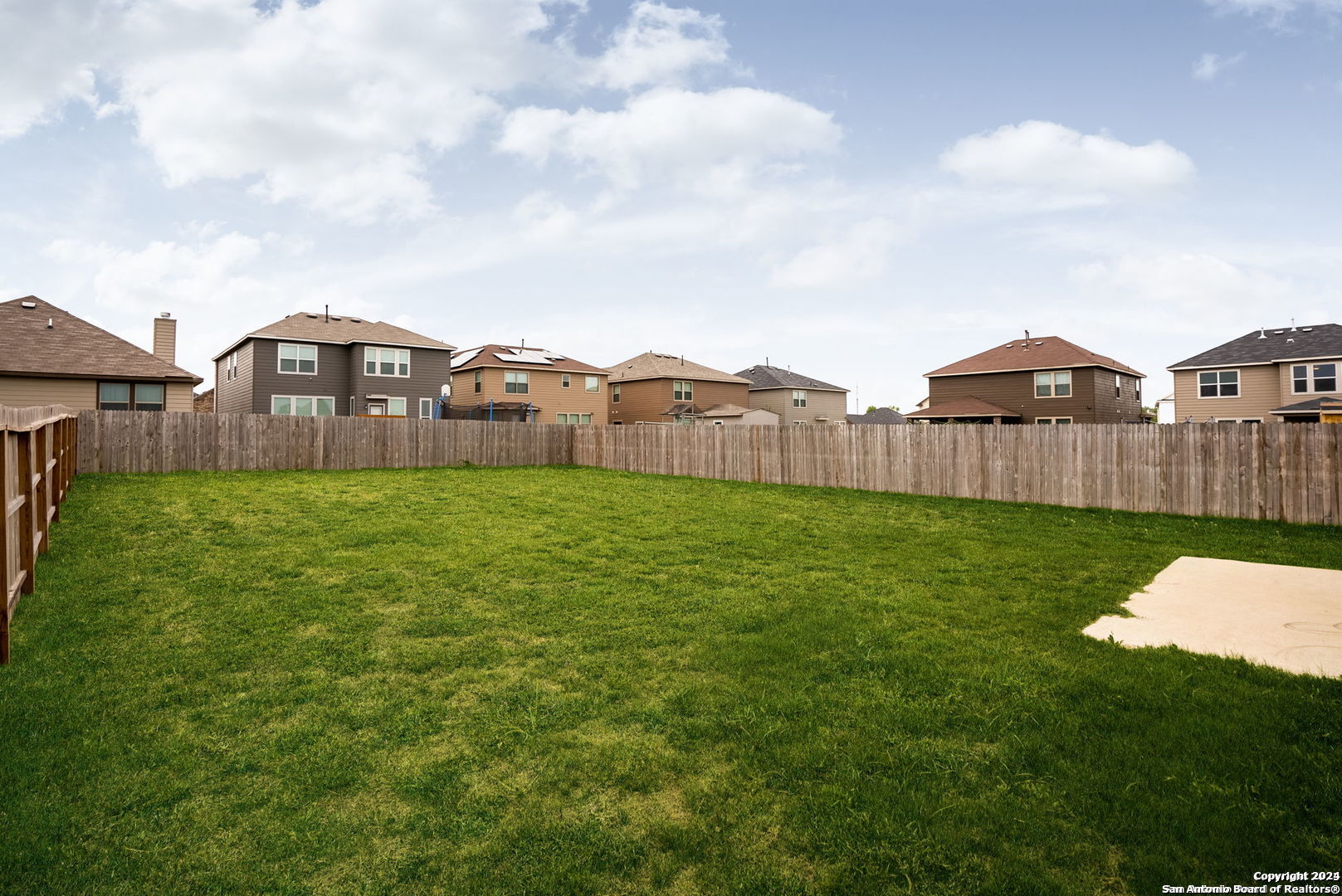 3619 Storm Moon Converse, TX 78109 - Photo 27 of 28 a view of a garden with a house in the background
